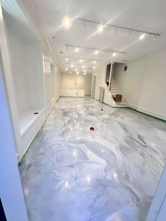 Finished basement floor with epoxy coating
